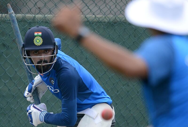 India's cricketer Lokesh Rahul (L) eyes the ball as he plays a shot during a practice session at the Sinhalease Sports Club (SSC) Ground in Colombo on August 2, 2017. 
The second Test cricket match between India and Sri Lanka starts in Colombo on August 3 / AFP PHOTO / LAKRUWAN WANNIARACHCHI
