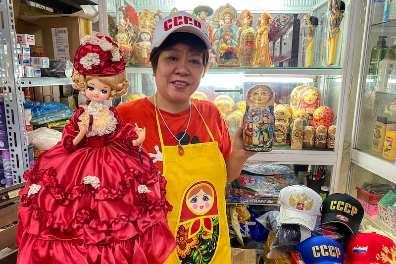 Nguyen Thi Hong Van, 55, a collector and seller of Russian souvenirs who lived in Russia for 20 years, in her shop in Vietnam's capital Hanoi. Reuters