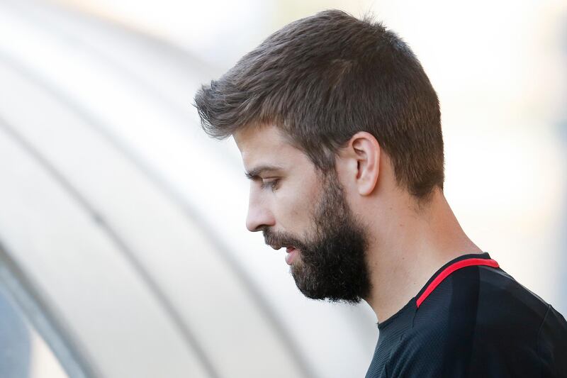 Barcelona defender Gerard Pique arrives for the training session. Pau Barrena / AFP