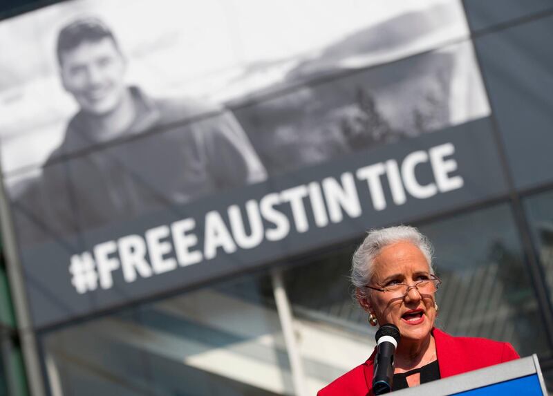 (FILES) In this file photo taken on November 02, 2016 Debra Tice speaks about her son Austin Tice, the only US journalist held captive in Syria, during the unveiling of a new banner calling for his release at the Newseum in Washington, DC. - Family and supporters of missing US journalist Austin Tice on August 14, 2018, will mark six years since his disappearance in Syria amid ongoing uncertainty about his whereabouts or condition. Tice's parents are scheduled to appear at a National Press Club exhibit opening featuring Tice's photographs from Syria. (Photo by Andrew CABALLERO-REYNOLDS / AFP)