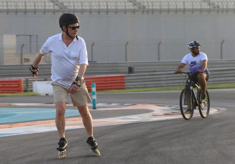 Sauli Niinisto, the president of Finland, goes rollerblading at Yas Marina Circuit on Sunday in Abu Dhabi, continuing his globetrotting tradition of diplomacy on wheels. Ravindranath K / The National