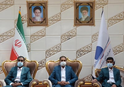 Three Iranian fishermen, who, according to maritime security officials, were released by Somali pirates after being held for five years, pose for a photo in the VIP hall of Imam Khomeini Airport, in Tehran, Iran August 21, 2020. WANA (West Asia News Agency) via REUTERS ATTENTION EDITORS - THIS IMAGE HAS BEEN SUPPLIED BY A THIRD PARTY