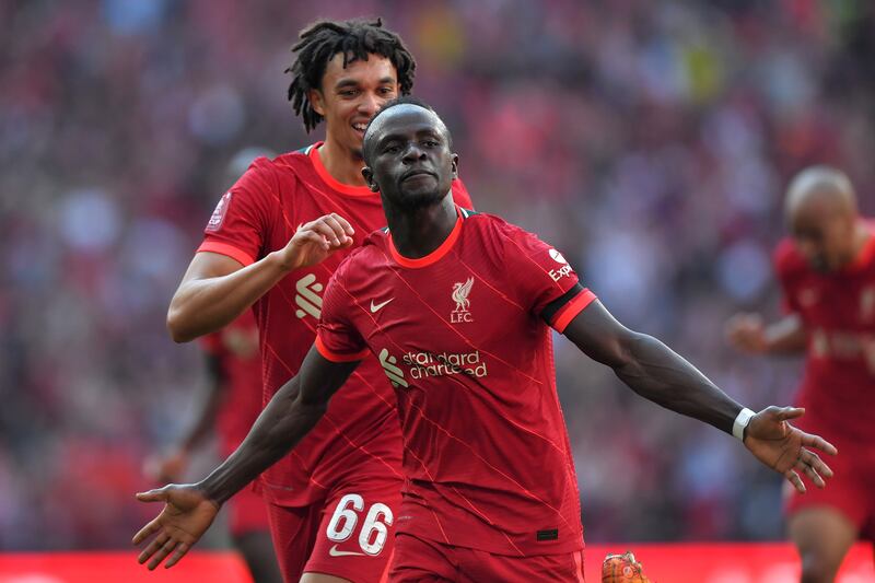 Liverpool's Sadio Mane (R) celebrates after scoring during the English FA Cup semi final match between Manchester City and Liverpool at Wembley Stadium, London, Britain, 16 April 2022.   EPA / VINCENT MIGNOTT