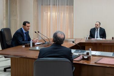 Syrian President Bashar Al Assad meets members of the government team handling Covid-19 in the capital Damascus. AFP
