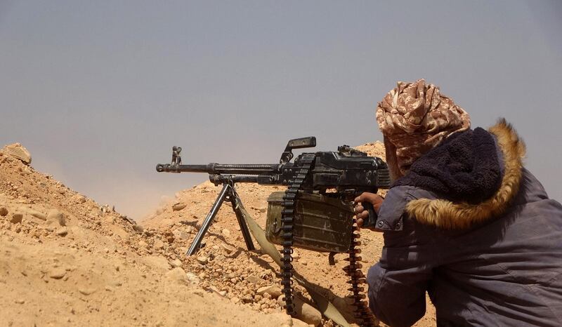 Forces loyal to Yemen's Saudi-backed government get into position during clashes with Houthi rebel fighters in Yemen's north-eastern province of Marib. AFP