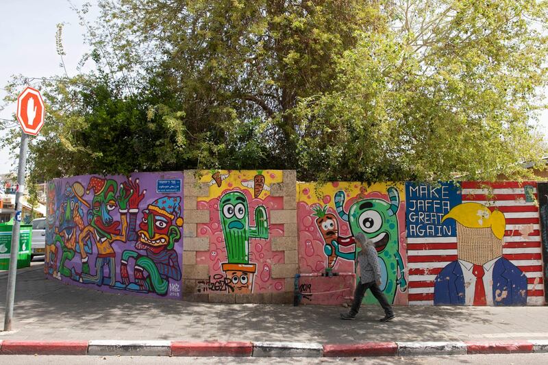 Graffiti adorns a wall in the Jaffa neighborhood of Tel Aviv, Israel. AP Photo