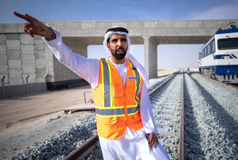 Omar Al Sebeyi, acting executive director of the commercial sector at Etihad Rail points out changes to the track.