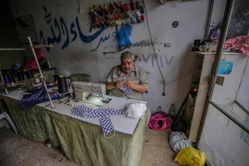 Abu Ghabin in his workshop in Gaza City. EPA