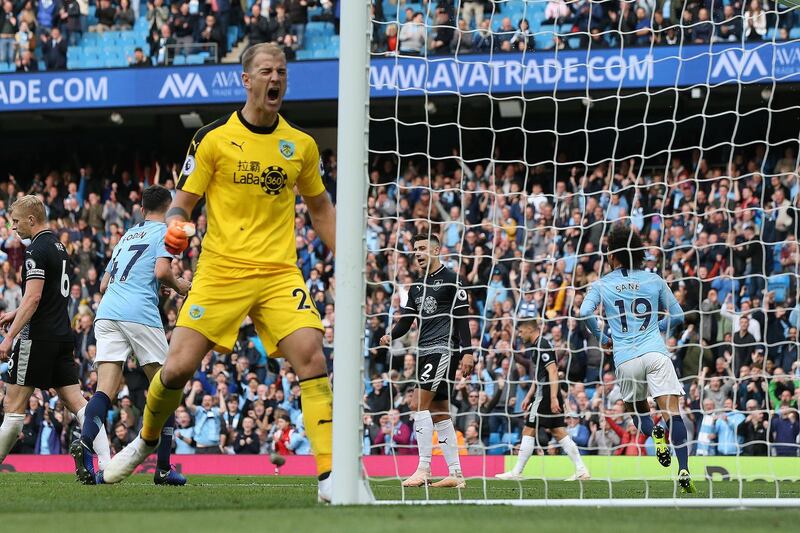 epa07107372 Burnley's goalkeeper Joe Hart (L) reacts after Manchester City's Leroy Sane (R) scored during the English Premier League soccer match between Manchester City and Burnley at the Etihad Stadium in Manchester, Britain, 20 October 2018.  EPA/NIGEL RODDIS EDITORIAL USE ONLY. No use with unauthorized audio, video, data, fixture lists, club/league logos or 'live' services. Online in-match use limited to 120 images, no video emulation. No use in betting, games or single club/league/player publications.