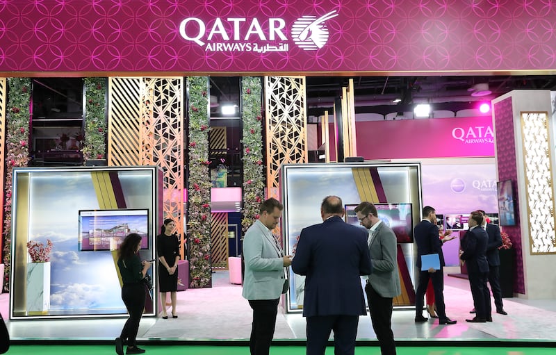 Visitors at the Qatar stand on the first day of Arabian Travel Market.