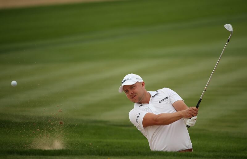 DUBAI, UNITED ARAB EMIRATES - FEBRUARY 01:  Peter Erofejeff of Finland in action during the second round of the Omega Dubai Desert Classic at Emirates Golf Club on February 1, 2013 in Dubai, United Arab Emirates.  (Photo by Andrew Redington/Getty Images) *** Local Caption ***  160469092.jpg