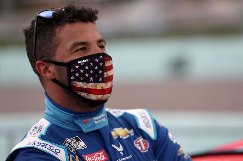 (FILES) In this file photo Bubba Wallace, driver of the #43 World Wide Technology Chevrolet, stands on the grid prior to the NASCAR Cup Series Dixie Vodka 400 at Homestead-Miami Speedway on June 14, 2020 in Homestead, Florida. NASCAR said Sunday night, June 21, that a noose was found in driver Bubba Wallace’s garage stall at Talladega Superspeedway in Alabama, and they have launched a probe of the "heinous" act. / AFP / GETTY IMAGES NORTH AMERICA / Chris Graythen
