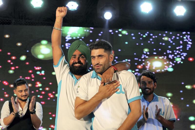 DUBAI , UNITED ARAB EMIRATES, September 27 , 2018 :- Left to Right – Jaspreet Singh from India ( 2nd runner up ), Ijaz Khawaja from Pakistan ( winner ) and Lovepreet Singh from India ( 1st runner up ) celebrating during the award ceremony of the Camp Ka Champ – DU singer of the Season held at Nuzul Accommodation in Jabel Ali Industrial area in Dubai. ( Pawan Singh / The National )  For News/Big Picture/Instagram/Online. Story by Patrick