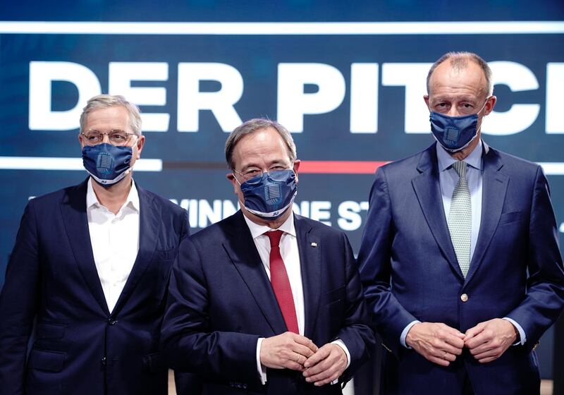 The three candidates for the chairmanship of the CDU, Norbert Roettgen, Armin Laschet, and Friedrich Merz. AP Photo