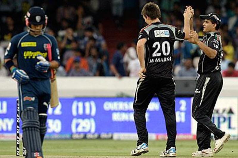 Sourav Ganguly, right, congratulates teammate Mitchell Marsh during his bowling spell against the Deccan Chargers.