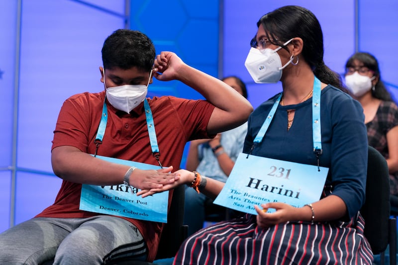 Harini Logan, 14, from San Antonio, Texas, and Vikram Raju, 12, from Aurora, Colorado during the finals of the Scripps National Spelling Bee. AP