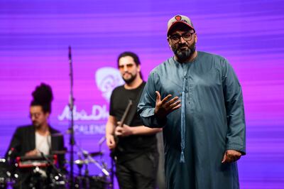 Comedian Ali Al Sayed hosted the Department of Culture and Tourism Live Talk Show, while the band Musicology provided live music. Khushnum Bhandari / The National
