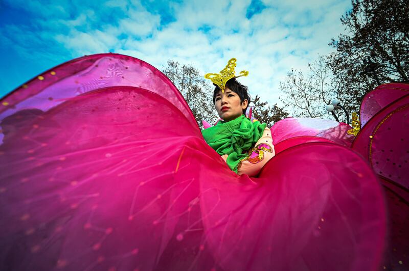 A performer in the Milan parade. AFP