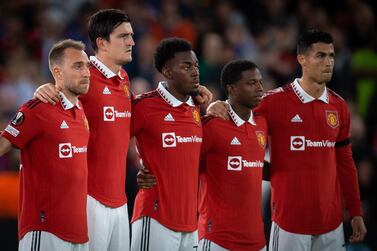 Manchester United players observe a minute of silence in memory of HRH Queen Elizabeth II before the UEFA Europa League round 1 soccer match between Manchester United and Real Sociedad held in Manchester, Britain, 08 September 2022.  According to a statement issued by Buckingham Palace on 08 September 2022, Britain's Queen Elizabeth II has died at her Scottish estate, Balmoral Castle, on 08 September 2022.   EPA / PETER POWELL