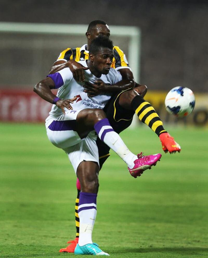 Asamoah Gyan, front, did not let Al Ittihad's defence get the best of him. His goal at the 40th minute tied the match. Additional goals by Omar Abdulrahman (66') and Diaky Ibrahim (83') lifted Al Ain to a 3-1 win and a 5-1 aggregate as they advance to the Asian Champions League semi-finals. AFP Photo