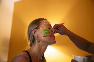 DUBAI, UNITED ARAB EMIRATES - JULY 26, 2018. 

Laura has her body painted by Tatiana. This activity is part of a community group that gathers to meditate.

(Photo by Reem Mohammed/The National)

Reporter: Haneen Dajani
Section: NA