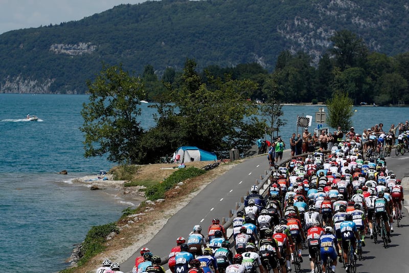 Cyclists in action next to Annecy Lake during the 10th stage of the Tour de France over 158,5km between Annecy and Le Grand-Bornand. Yoan Valat / EPA