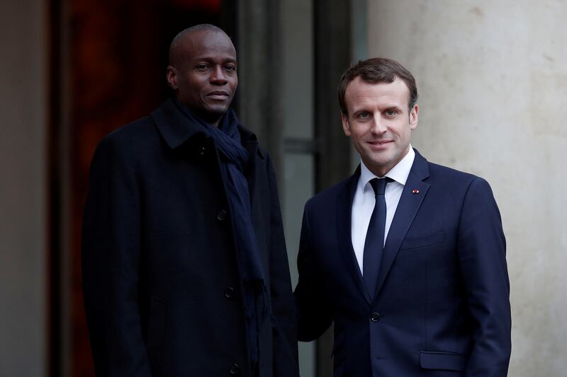 French President Emmanuel Macron welcomes Haitian President Jovenel Moise at the Elysee Palace in Paris, 2017.
