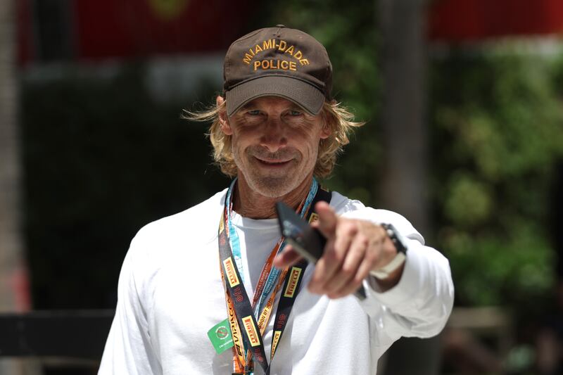 Movie director Michael Bay walks in the paddock prior to the F1 Grand Prix of Miami. Getty