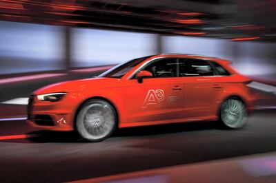 The new Audi A3 Sportback e-tron is presented during a preview show by Volkswagen Group on March 3, 2014 on the eve of the press day of the Geneva Motor Show in Geneva. AFP PHOTO / FABRICE COFFRINI / AFP PHOTO / FABRICE COFFRINI