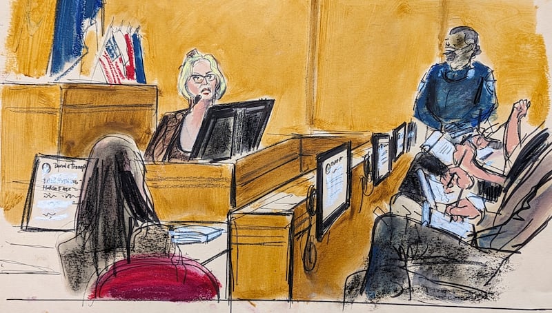 A sketch shows jurors taking notes as Ms Daniels testifies on May 7. Elizabeth Williams / AP