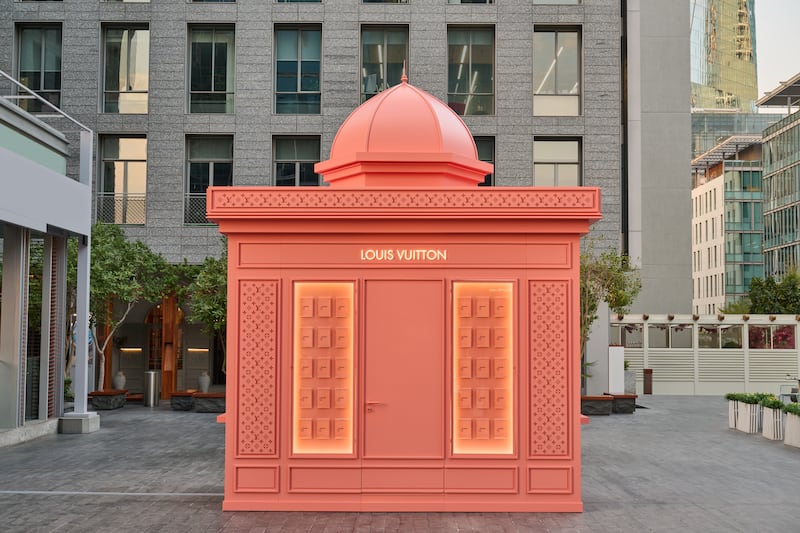 The kiosk has been designed in the same pink hue as the guide's cover