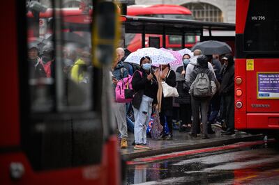 Commuters queue to board packed buses at Victoria Station on Monday morning during Tube strikes. Getty Images