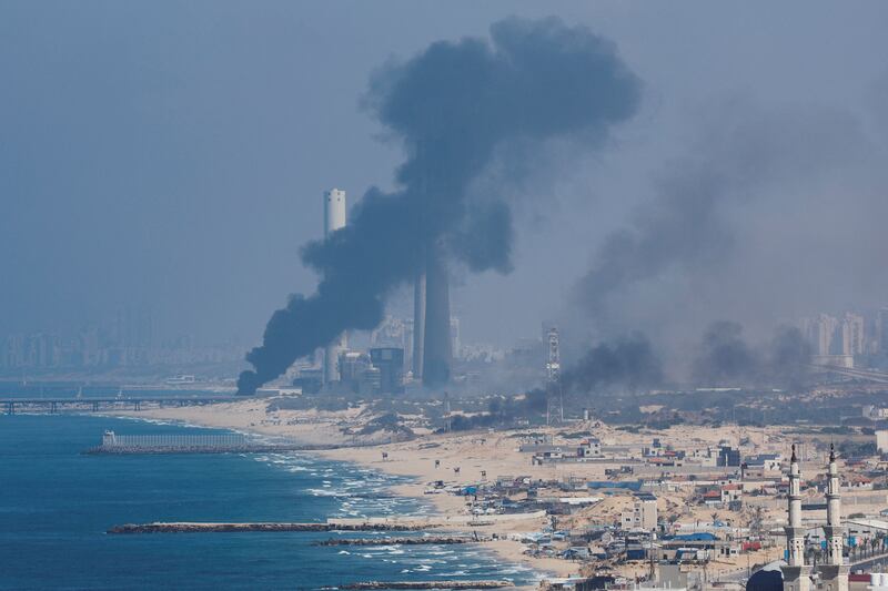 Smoke rises following Israeli strikes in Gaza. Reuters