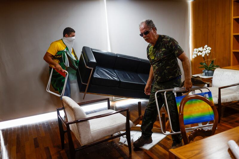 Some Bolsonao supporters ransacked offices and caused damage. Reuters