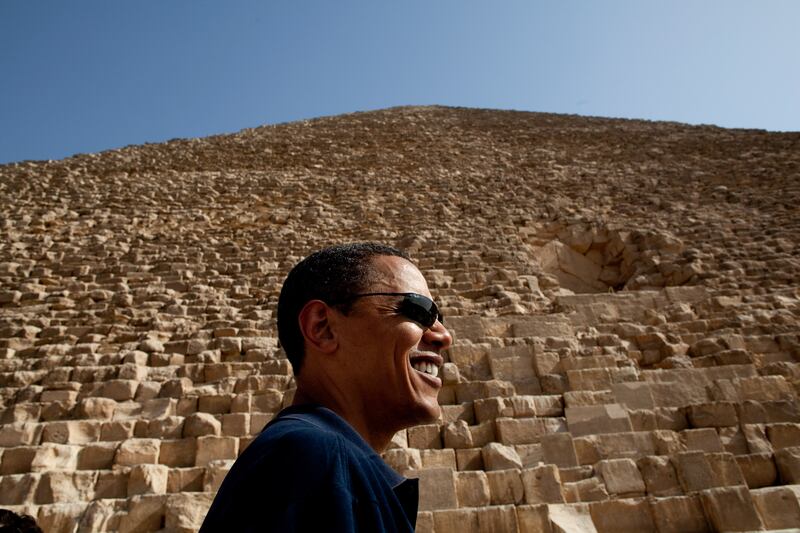 Mr Obama walking near the pyramids in Egypt.  Photo courtesy of the National Archives