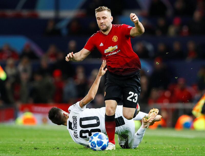 Juventus' Rodrigo Bentancur in action with Manchester United's Luke Shaw. Reuters