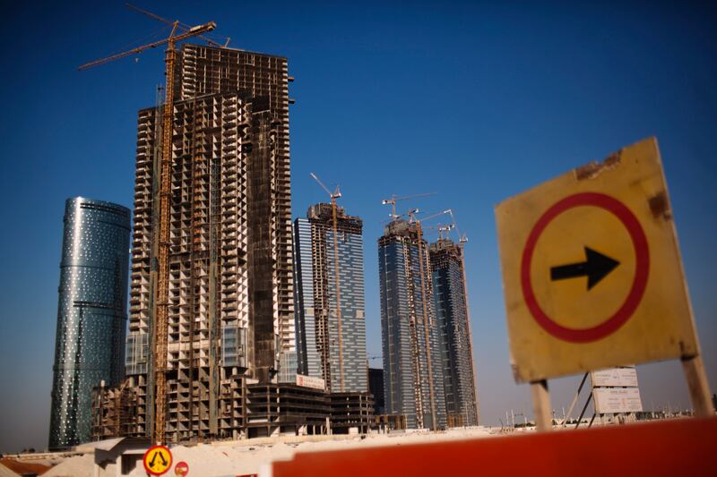 ABU DHABI, UAE - October 10, 2011- Sun and Sky Towers are currently being constructed on Reem Island.   Reem Island, a natural island 600 meters off the coast of Abu Dhabi island is a residential, commercial and business project. It is currently being developed separately by Sorouh Real Estate, Reem Investments, and Tamouh.    (Andrew Henderson / The National) 