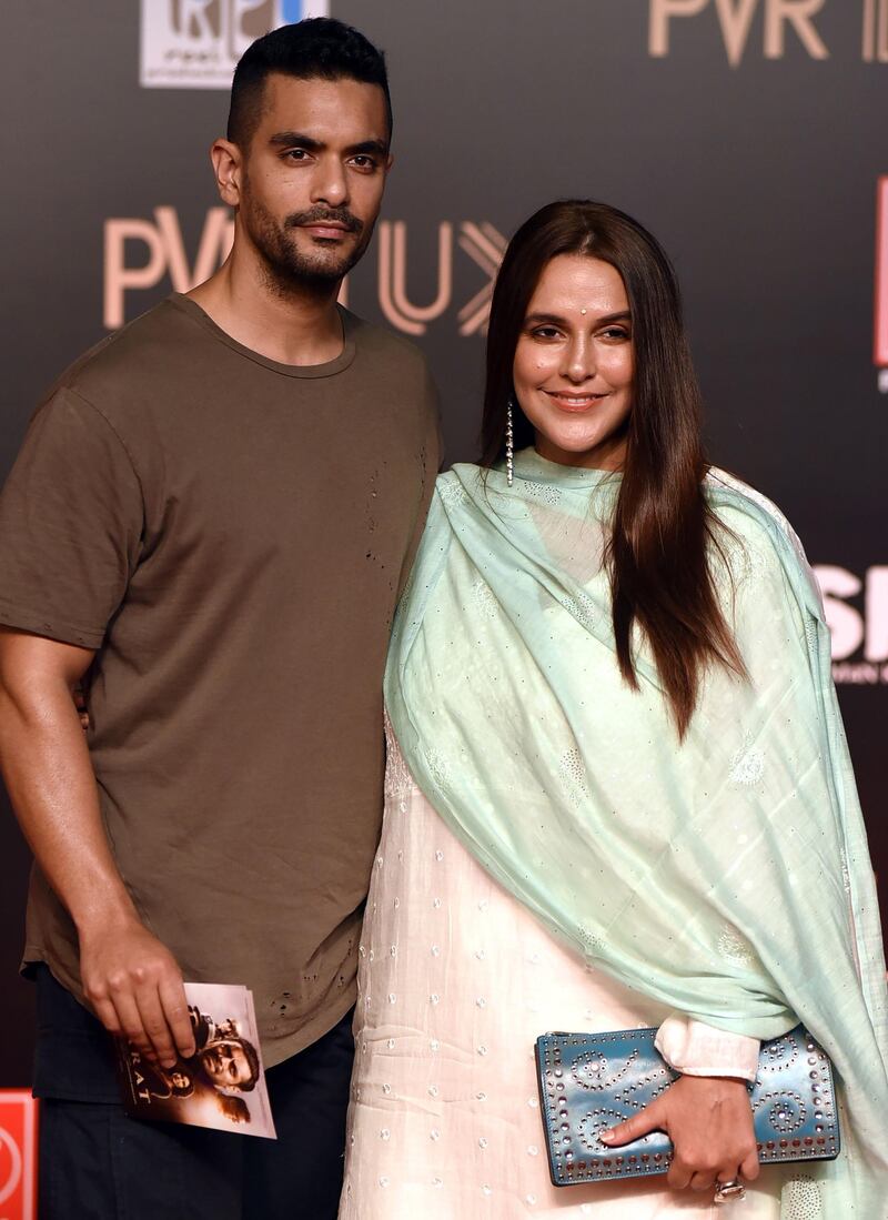 Bollywood actors Angad Bedi, left, and Neha Dhupia attend the premiere of Hindi film 'Bharat' in Mumbai on June 4, 2019.  AFP