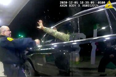 An image taken from police video shows an officer using a spray on Caron Nazario on December 20, 2020, in Windsor, Virginia. Windsor Police via AP
