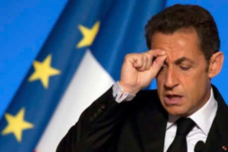 French President Nicolas Sarkozy gestures as he delivers a speech on the business and financial outlook for the press industry at the Elysee Palace, in Paris, Thursday, Oct. 2, 2008. (AP Photo/Philippe Wojazer, Pool) *** Local Caption ***  PAR116_FRANCE_PRESS.jpg