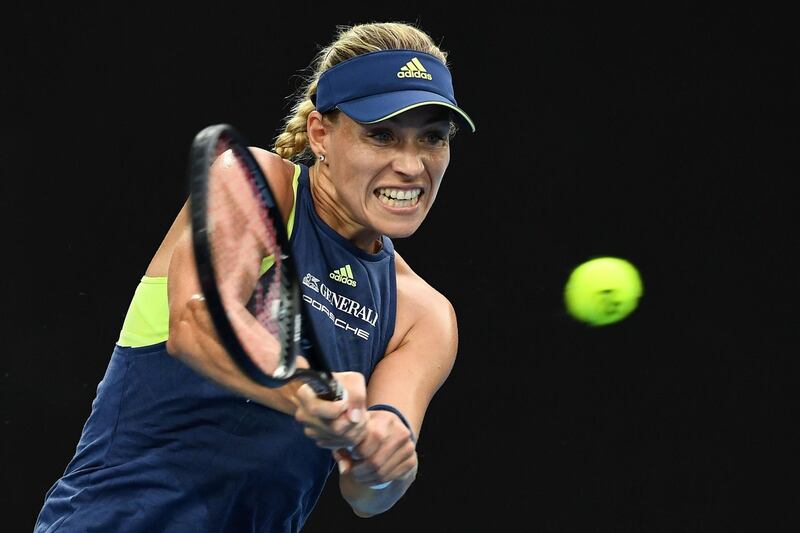 Angelique Kerber plays a backhand in her third round match against Maria Sharapova. Quinn Rooney / Getty Images