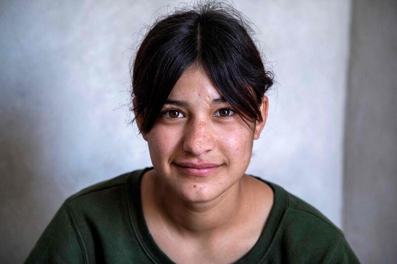 Fawziya Jasim, 16, was one of many affected when ISIS fighters swept over Mount Sinjar in August 2014. All photos: AFP