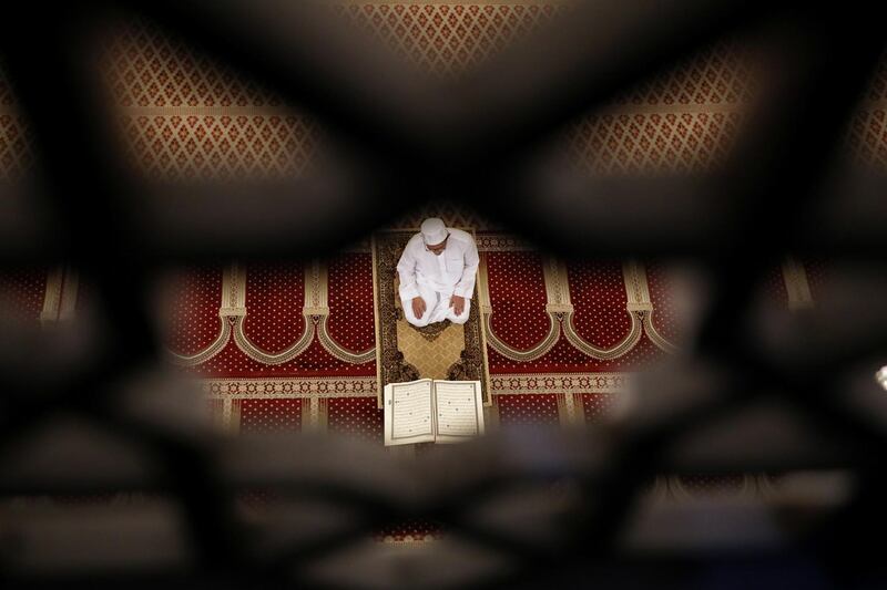 An Imam performs prayer inside National Mosque as it is closed on the first day of Ramadan, in Kuala Lumpur, Malaysia, on April 24, 2020. Reuters