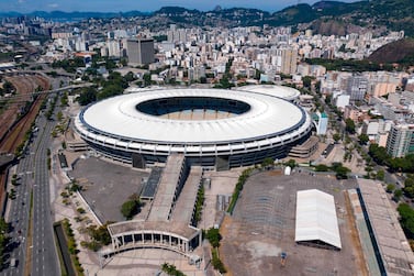Aerial view of a temporary field hospital set up for coronavirus patients at Maracana stadium complex, where the Celio de Barros athletics track used to be located in Rio de Janeiro, Brazil on April 02, 2020. Brazil's most famous stadium allowed health authorities to turn part of its complex into a field hospital to face the coronavirus pandemic. / AFP / MAURO PIMENTEL