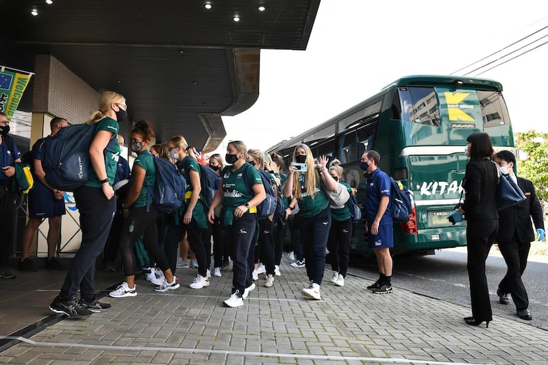 Australian softball national team players arrive at their hotel in Ota City. AFP