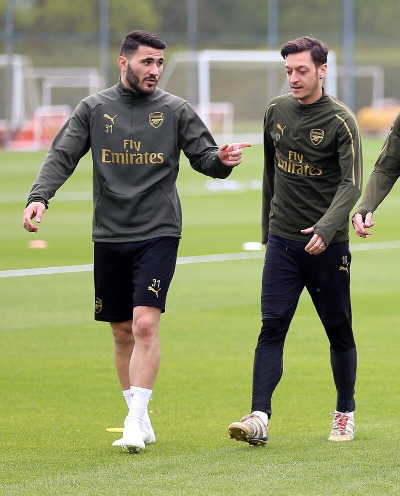 File photo dated 01-05-2019 of Arsenal's Sead Kolasinac (left) and Mesut Ozil. PRESS ASSOCIATION Photo. Issue date: Thursday July 25, 2019. Arsenal full-back Sead Kolasinac fought off two men wielding knives after he and team-mate Mesut Ozil were attacked in north London on Thursday. See PA story SOCCER Arsenal Kolasinac. Photo credit should read Nigel French/PA Wire