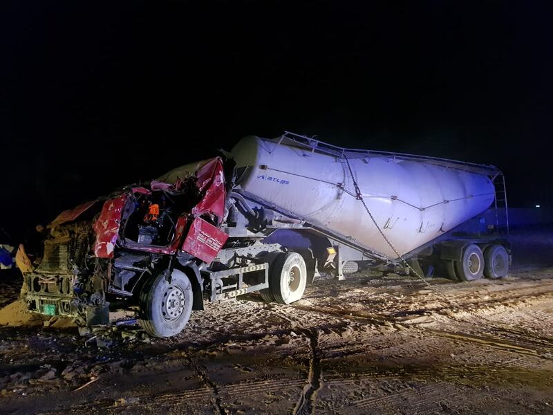 The driver had to be extracted from this lorry after it swerved off the road in Ajman. Ajman Civil Defence