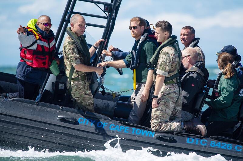 Prince Harry, Duke of Sussex travels on a South African Maritime Police Unit RIB during a visit to Kalk Bay Harbour on September 24, 2019 in Cape Town, South Africa. The boat travelled to Seal Island, an abalone poaching hot spot. Abalone, a type of sea snail, is now at critically low levels because of over-exploitation and poaching. Getty Images