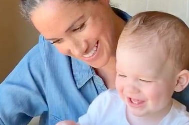 Meghan, Duchess of Sussex, reads to baby Archie in a video released to mark his first birthday. Instagram / Save the Children