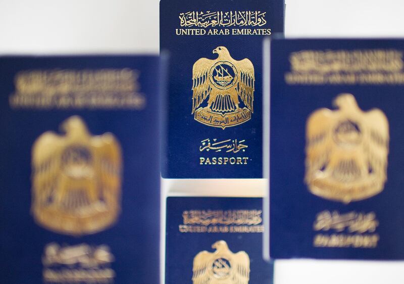 Abu Dhabi - July 2, 2008. Studio photos of United Arab Emirates passports. ( Philip Cheung / The National ) *** Local Caption ***  PC0038-passport.jpgna03 passport.jpg